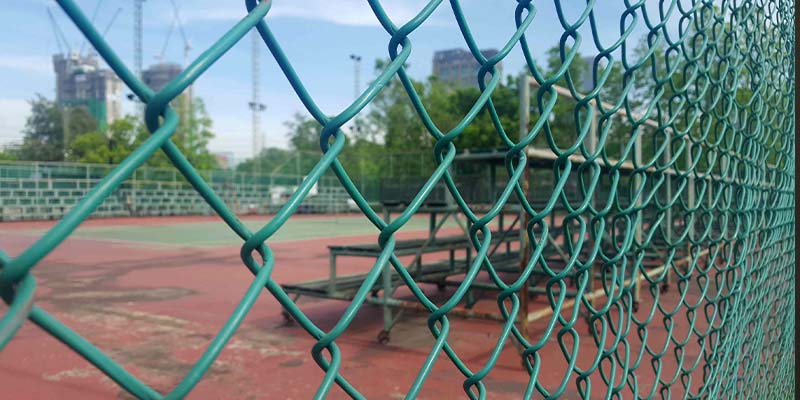 Green residential Chain Link fence installation in Salt Lake City, Utah